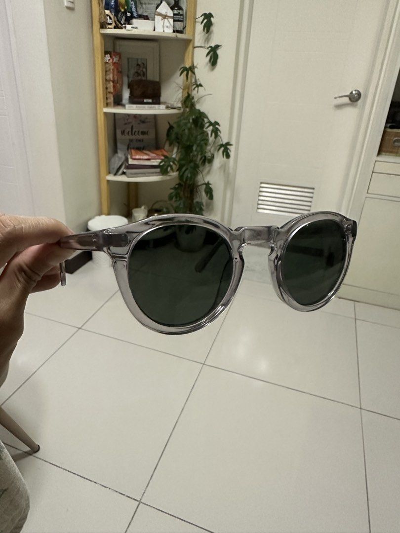 Maison Mata Sunglasses Grey Translucent Frame (Category: Sunglasses & Eyewear) located in Manila. Submitted by rubayne (Listing ID 1441930148, Image 2). Description: - Grey translucent frame sunglasses - Dark lenses for sun protection - Comes with a brown leather case - Case features 'MAISON MATA' embossed detail - Ideal for sunny weather - PM for more photos - RFS: Does not fit my face properly.