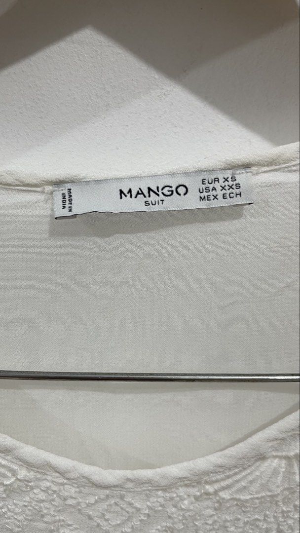 Mango White Embroidered Sleeveless Peplum Top (Category: Sleeveless) located in Las Pinas. Submitted by qcleopatrastrove (Listing ID 1441916376, Image 2). Description: *Small tears at front and back near the arm hole (See photo nos. 5 and 6) Please manage your expectations. Thank you.🤎.