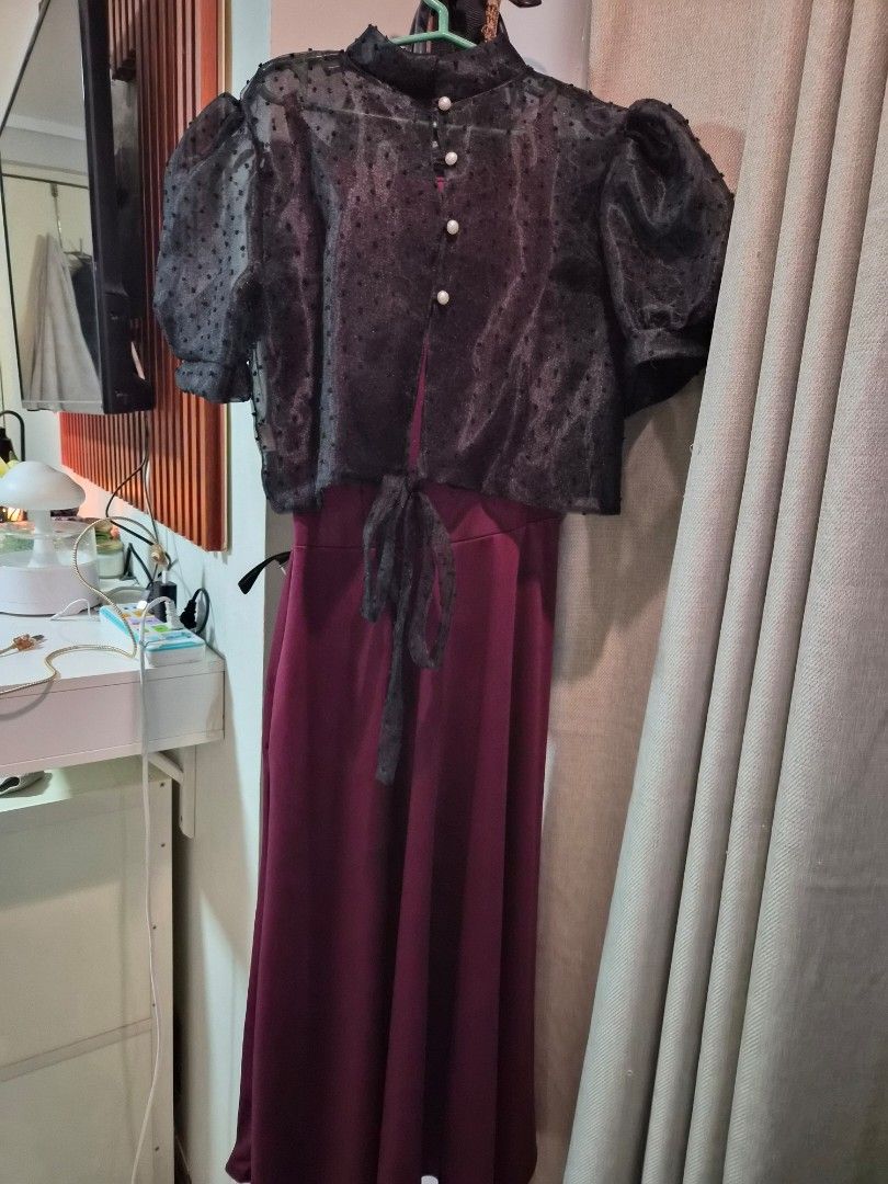 Maroon Maxi Dress with Black Sheer Overlay Top (Category: Dresses) located in Las Pinas. Submitted by prettychat (Listing ID 1441908881, Image 2). Description: - Two-piece outfit: Maroon maxi dress with flowing skirt and fitted bodice. - Black lacey Filipiana top with puff sleeves and pearl button details. - Adjustable tie at the waist for a custom fit. - Ideal for parties, events, or any special occasion. - Comfortable and stylish design..