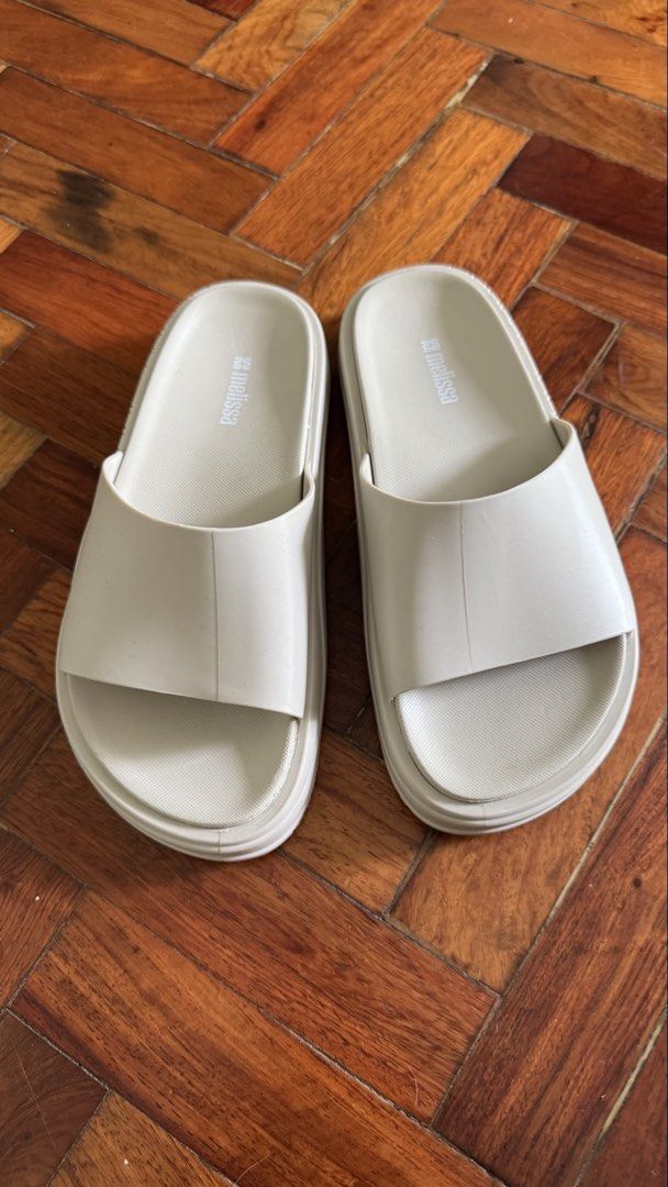 Melissa Slides Beige Size US 7 EU 38 (Category: Slippers and slides) located in Makati City. Submitted by preloved_biancak (Listing ID 1441792933, Image 2). Description: Only tried on once, good as new SRP 3,295 Selling for 1,500 - Brand: Melissa - Color: Light Beige - Size: US 7, EU 38 - Origin: Made in Brazil - Features: Super comfy, easy slip-on, unique sole tread pattern - Ideal for: Casual wear, poolside.