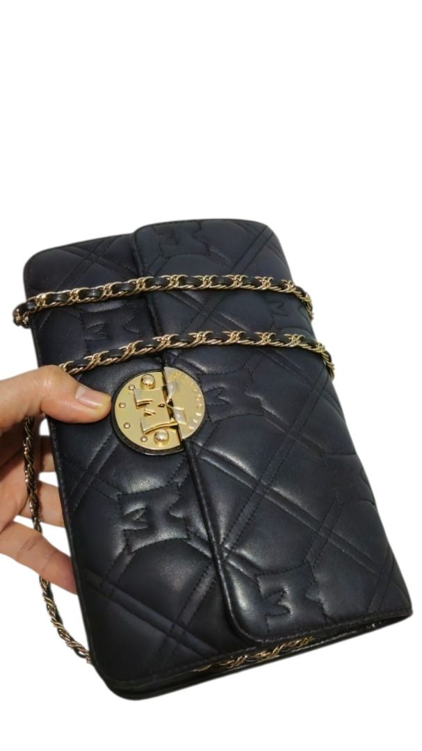 Metrocity Black Quilted Chain Bag (Category: Shoulder Bags) located in Quezon City. Submitted by kirstenbella (Listing ID 1441830536, Image 3). Description: 💯Authentic Metrocity - Stylish black quilted shoulder bag - Genuine leather - Elegant gold chain strap - Front circular gold clasp with logo detail - Interior zippered compartment for secure storage - Lining features a repeating logo pattern - Ideal for carrying your daily essentials - In Ex