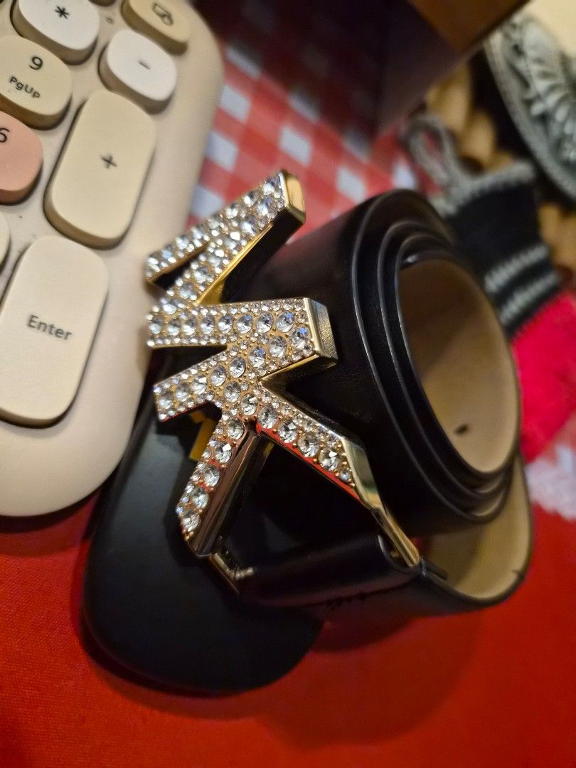 Michael Kors MK Belt with Rhinestones (Category: Belts) located in Las Pinas. Submitted by prettychat (Listing ID 1441911545, Image 2). Description: - original MK belt padala from the U.S SIZE small / 35 inches slightly used -Black leather belt - Gold MK buckle with rhinestone embellishments - Smooth leather finish - Gold hardware.