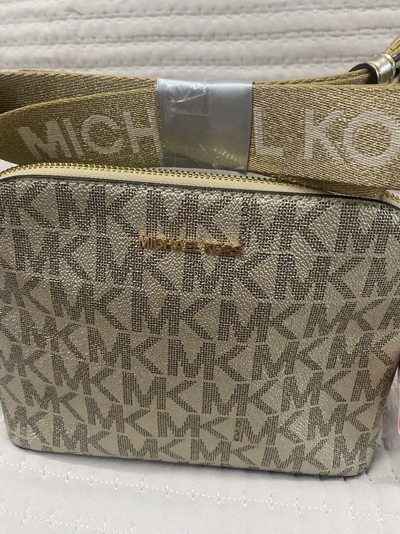 Michael Kors Monogram Crossbody Bag Gold (Category: Luxury Bags & Wallets) located in Quezon City. Submitted by viacb (Listing ID 1441938194, Image 2). Description: mop: gcash mod: jnt/lalamove *location: quezon city.