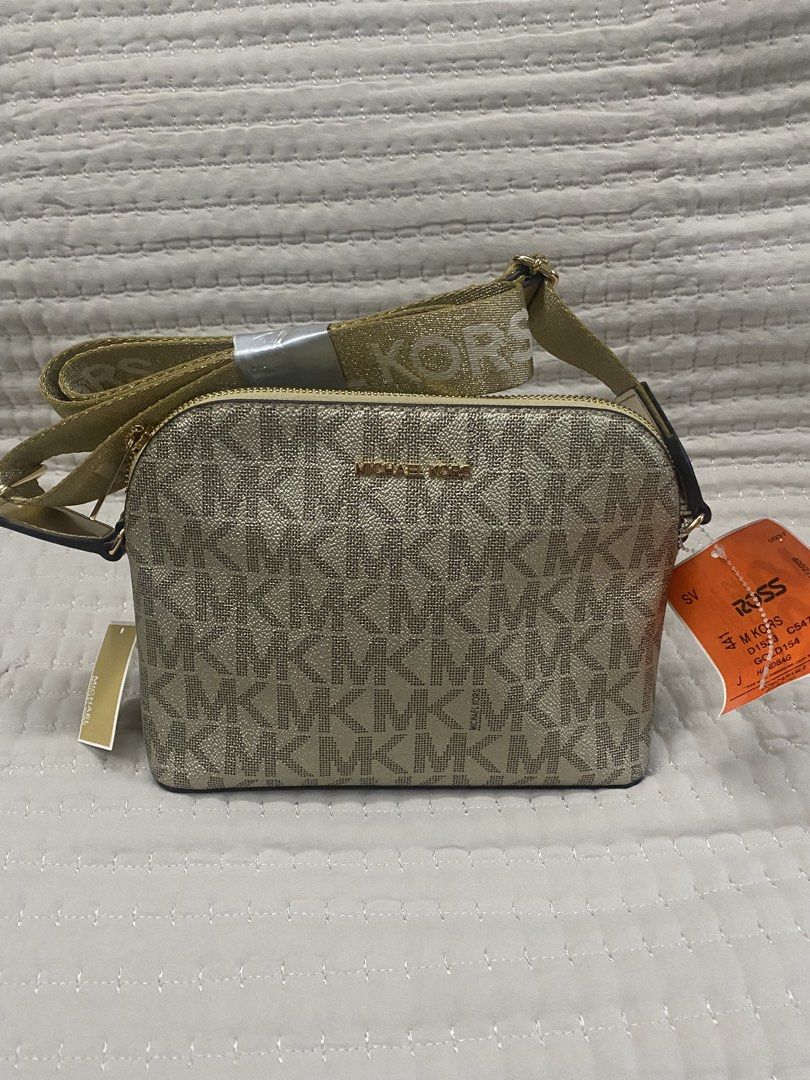 Michael Kors Monogram Crossbody Bag Gold (Category: Luxury Bags & Wallets) located in Quezon City. Submitted by viacb (Listing ID 1441938194, Image 1). Description: mop: gcash mod: jnt/lalamove *location: quezon city.