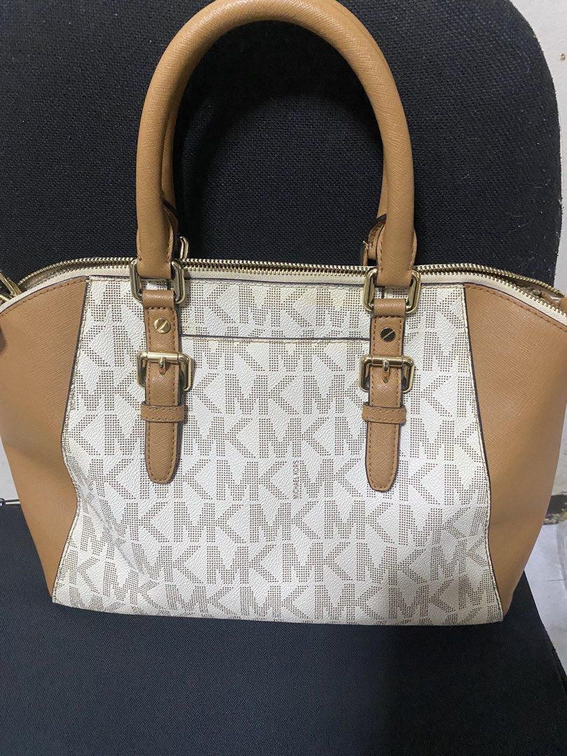 Michael Kors Signature Monogram Tote Bag (Category: Luxury Bags & Wallets) located in Las Pinas. Submitted by ecarg2072 (Listing ID 1441858010, Image 2). Description: - Authentic Michael Kors tote bag - Signature MK print all over - Tan leather trim and handles - Gold hardware details - Zipper closure for security - Includes a detachable shoulder strap - Spacious interior for all your essentials.