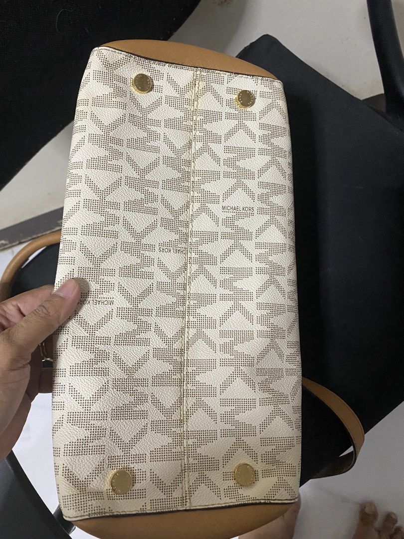 Michael Kors Signature Monogram Tote Bag (Category: Luxury Bags & Wallets) located in Las Pinas. Submitted by ecarg2072 (Listing ID 1441858010, Image 1). Description: - Authentic Michael Kors tote bag - Signature MK print all over - Tan leather trim and handles - Gold hardware details - Zipper closure for security - Includes a detachable shoulder strap - Spacious interior for all your essentials.