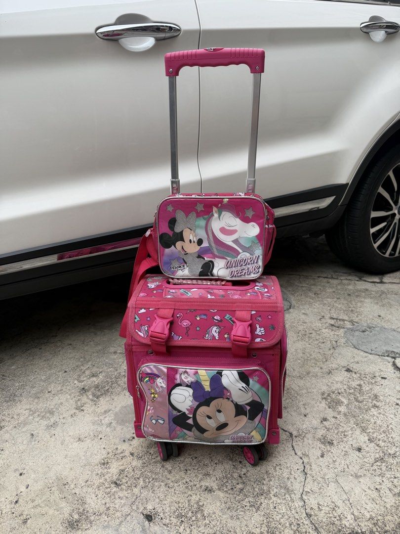 Minnie Mouse Unicorn Dreams Rolling Backpack & Lunch Bag Set (Category: Babies & Kids Fashion) located in Mandaluyong City. Submitted by _jlasb (Listing ID 1441866053, Image 1). Description: For Sale: Minnie Mouse Stroller Bag with Matching Lunch Bag 🎀 📏 Size: 30 cm x 21.5 cm x 34 cm 💰 Price: ₱1,800 (last price) Condition: Good overall condition, just needs a little cleaning..