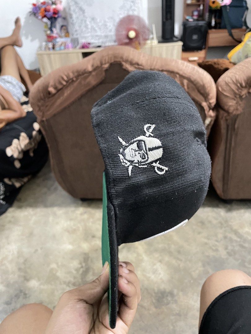 Mitchell & Ness NFL Raiders Vintage Collection Cap (Category: Caps & Hats) located in Manila. Submitted by cosmicearth_67b6b9 (Listing ID 1441935090, Image 2). Description: - Mitchell & Ness NFL Raiders Cap - Vintage Collection - Color: Black with White Raiders Logo - Green Underbrim - Made in Bangladesh (check tags for details) - Ideal for any Raiders fan.