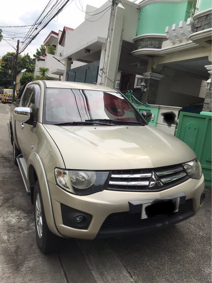 Mitsubishi Strada GLX Manual (Category: Used Cars) located in Quezon City. Submitted by jbalt (Listing ID 1441839009, Image 2). Description: 2010 Mitsubishi Pickup Strada GLX 4X2 Manual Transmission. 1st owner and updated car registration. 90km Mileage. Makinis Beige Color with 10-inch android head unit (Netflix, YouTube, Sportify, etc.), android auto/apple carplay and JBL subwoofer, Carryboy automatic roller lid, bedliner, Carryboy roll bar, rev