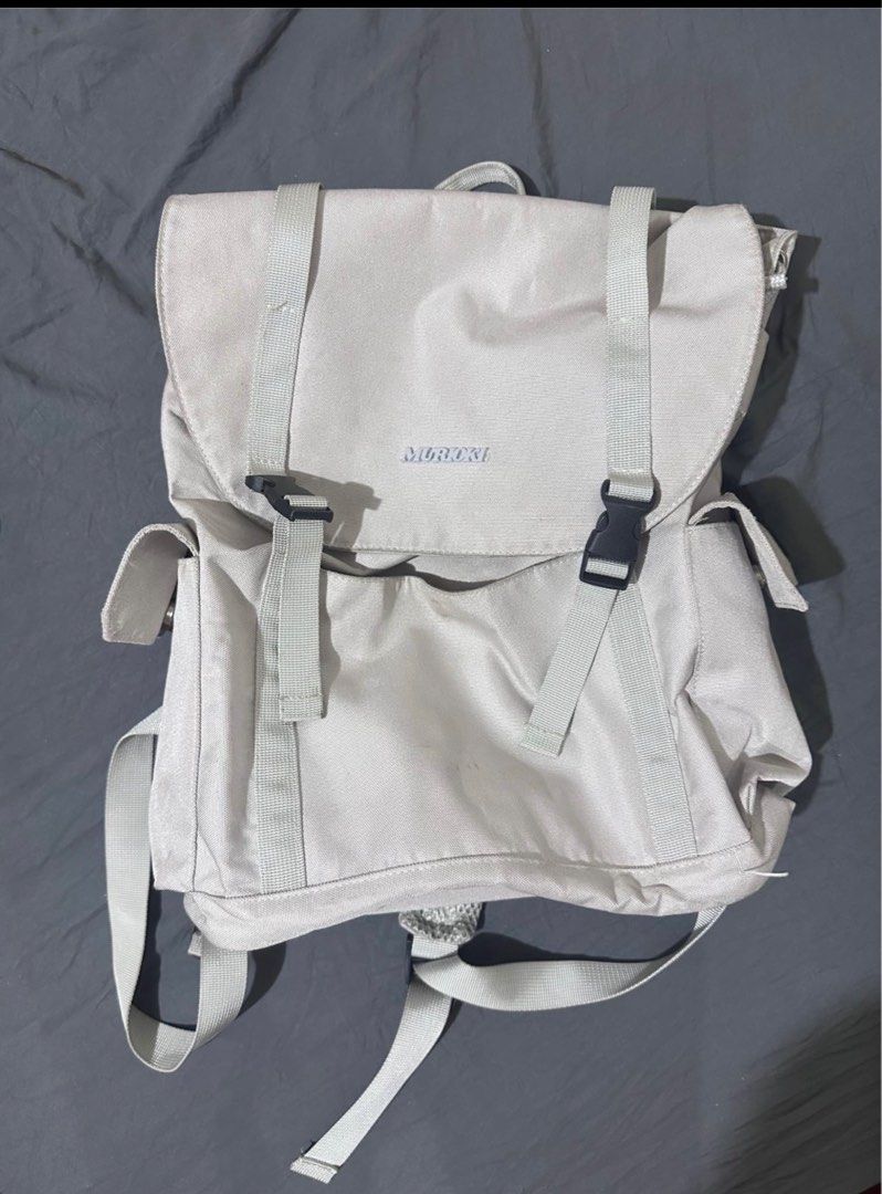 Morioki Backpack (Category: Backpacks) located in Taytay. Submitted by declutter_random (Listing ID 1441810776, Image 1). Description: - Light beige backpack - With Laptop sleeve - Side pockets on both sides - Padded straps for comfortable carrying - Zippered pocket on the back - Ideal for everyday use or travel.