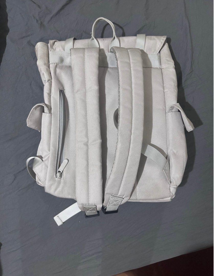 Morioki Backpack (Category: Backpacks) located in Taytay. Submitted by declutter_random (Listing ID 1441810776, Image 2). Description: - Light beige backpack - With Laptop sleeve - Side pockets on both sides - Padded straps for comfortable carrying - Zippered pocket on the back - Ideal for everyday use or travel.