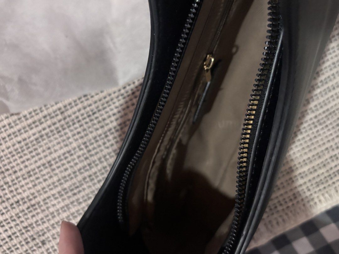 Mumu Select Black Shoulder Bag (Category: Shoulder Bags) located in Pasay City. Submitted by alt.collectives (Listing ID 1441867674, Image 2). Description: Once used - Closure: Zipper - Interior: Zip pocket - Includes: Dust bag - Design: Simple and classic.