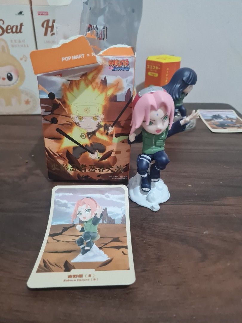 Naruto Pop Mart Blind Box Figures Sakura Hinata (Category: Designer & Blind Box Toys) located in Quezon City. Submitted by declutter1990 (Listing ID 1441803730, Image 2). Description: - Authentic Naruto blind box figures featuring Sakura and Hinata. - Includes original boxes and character cards. - A must-have addition for any Naruto fan's collection..