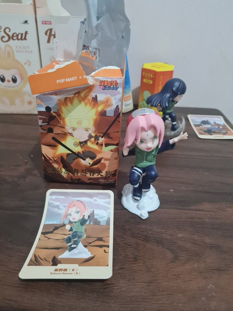 Naruto Pop Mart Blind Box Figures Sakura Hinata (Category: Designer & Blind Box Toys) located in Quezon City. Submitted by declutter1990 (Listing ID 1441803730, Image 1). Description: - Authentic Naruto blind box figures featuring Sakura and Hinata. - Includes original boxes and character cards. - A must-have addition for any Naruto fan's collection..