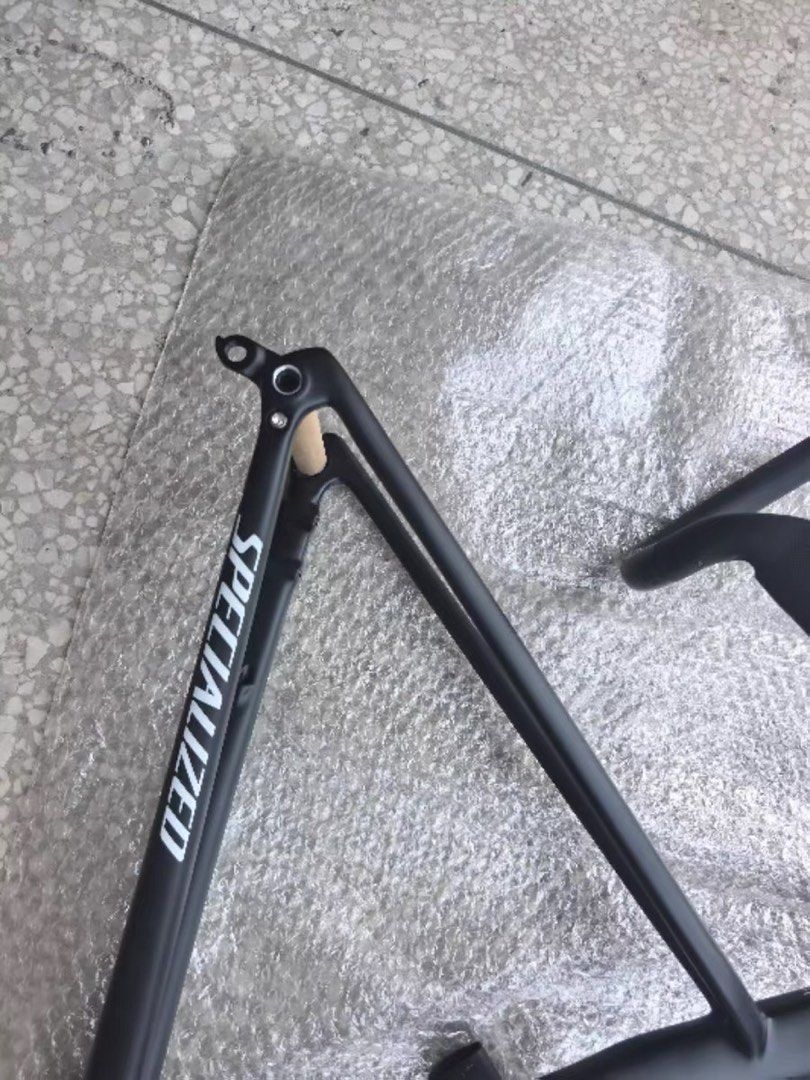 NEGOTIABLE ‼️Specialized S-Works Carbon Road Bike Frame with Handlebar (Category: Parts & Accessories) located in Singapore. Submitted by sg.carbonworks (Listing ID 1441851071, Image 3). Description: NEGOTIABLE ‼️ - OEM Specialized S-Works carbon road bike frame set - Matte black finish - White S-Works and Specialized branding - Integrated handlebar included - Fork included - Perfect for your next custom road bike build The best carbon products. 