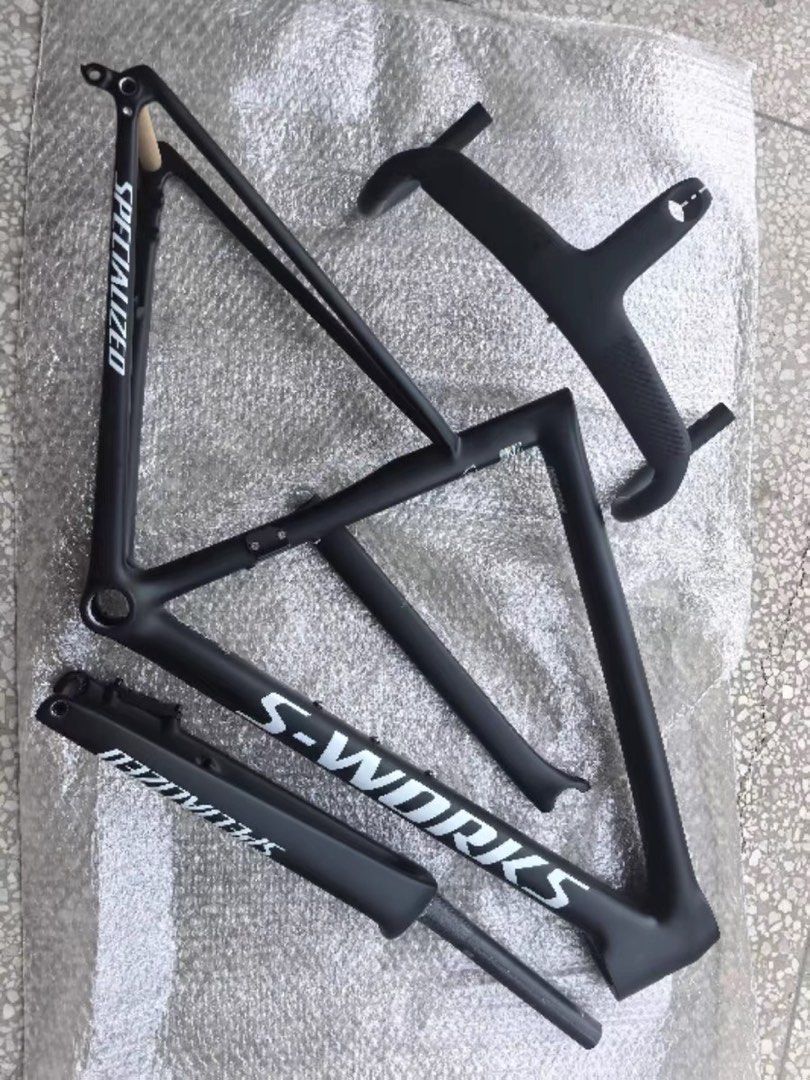 NEGOTIABLE ‼️Specialized S-Works Carbon Road Bike Frame with Handlebar (Category: Parts & Accessories) located in Singapore. Submitted by sg.carbonworks (Listing ID 1441851071, Image 2). Description: NEGOTIABLE ‼️ - OEM Specialized S-Works carbon road bike frame set - Matte black finish - White S-Works and Specialized branding - Integrated handlebar included - Fork included - Perfect for your next custom road bike build The best carbon products. 