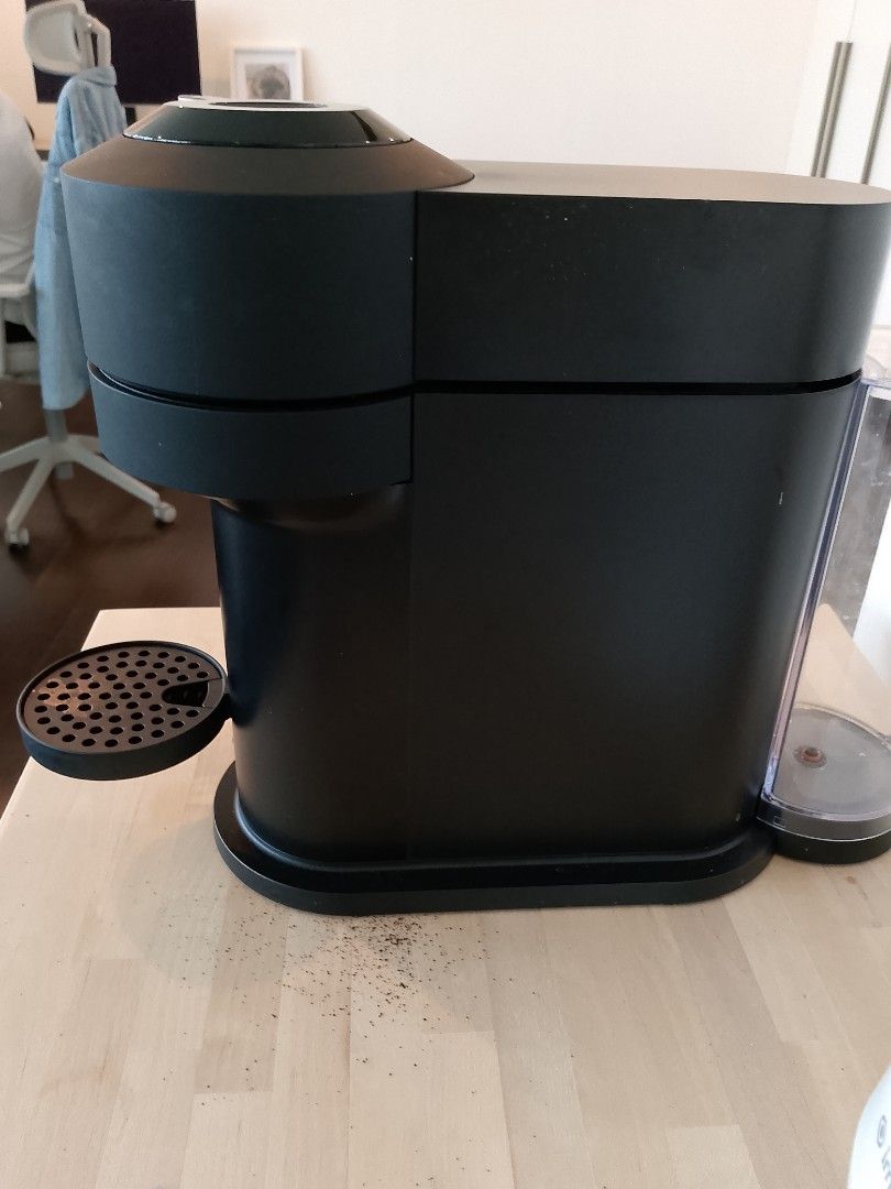 Nespresso Vertuo Coffee Machine (Category: Coffee Machines & Makers) located in Manila. Submitted by tarah.malditah (Listing ID 1441861555, Image 3). Description: - Black Nespresso Vertuo coffee machine - Works well, perfect for your daily coffee fix - Easy to use - Comes with water tank - Minor coffee grounds around the base (selling as is).