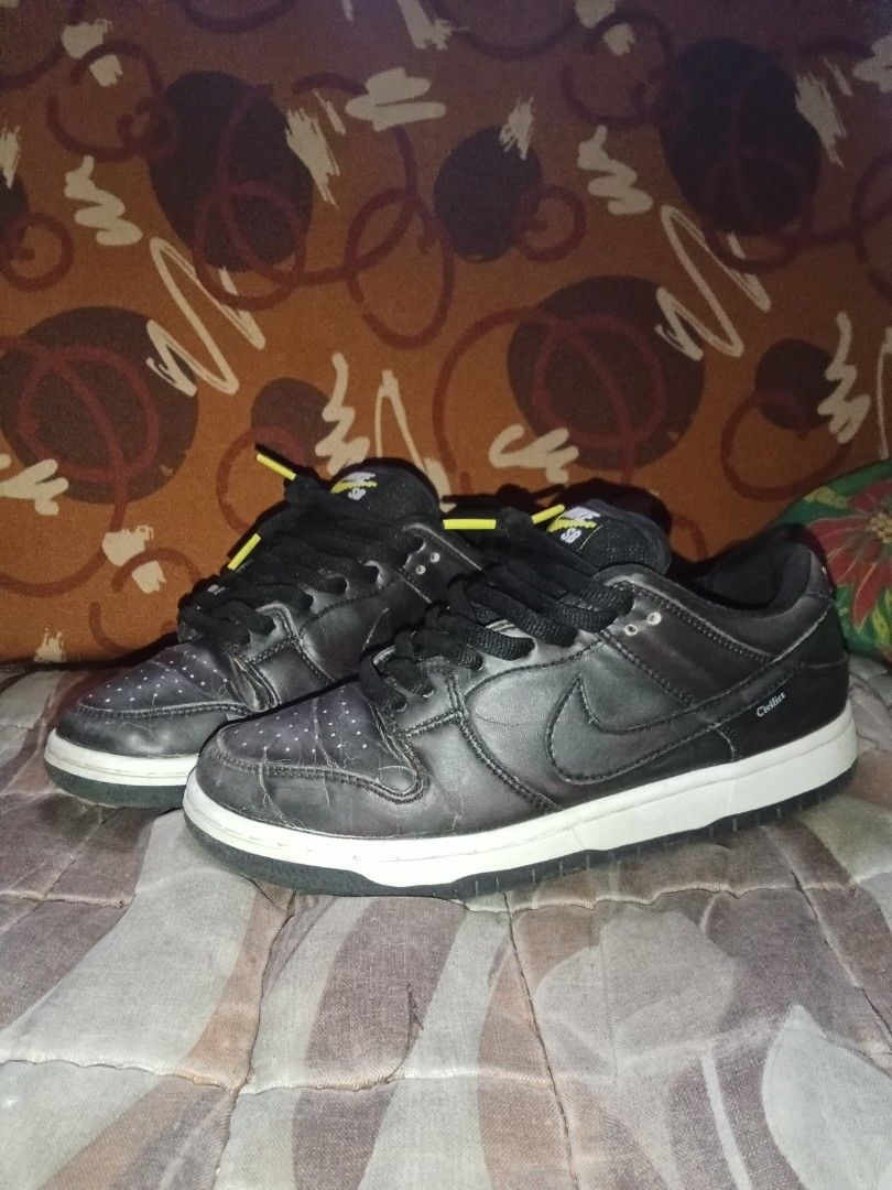 Nike SB Dunk Low Civilist Black (Category: Sneakers) located in Baguio. Submitted by thrifted-_-baguio26211 (Listing ID 1441858478, Image 2). Description: - Authentic Nike SB Dunk Low Civilist sneakers - Classic Nike SB branding on tongue - Civilist tag detail on side - Ideal for skateboarding and casual wear - Made in Vietnam.