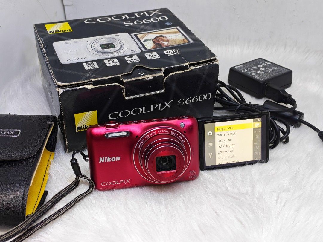 nikon coolpix s6600 (Category: Cameras) located in Manila. Submitted by ultimogizmos (Listing ID 1441836793, Image 2). Description: The Nikon Coolpix S6600 is a compact point-and-shoot camera known for its versatile 12x optical zoom and a fully articulating "flipping" LCD screen that makes it highly popular for selfies and vlogging. Key Features *16 megapixel BSI CMOS sensor *12x optical zoom lens (35mm equiv: 25-300mm) *Optical image stabilisati