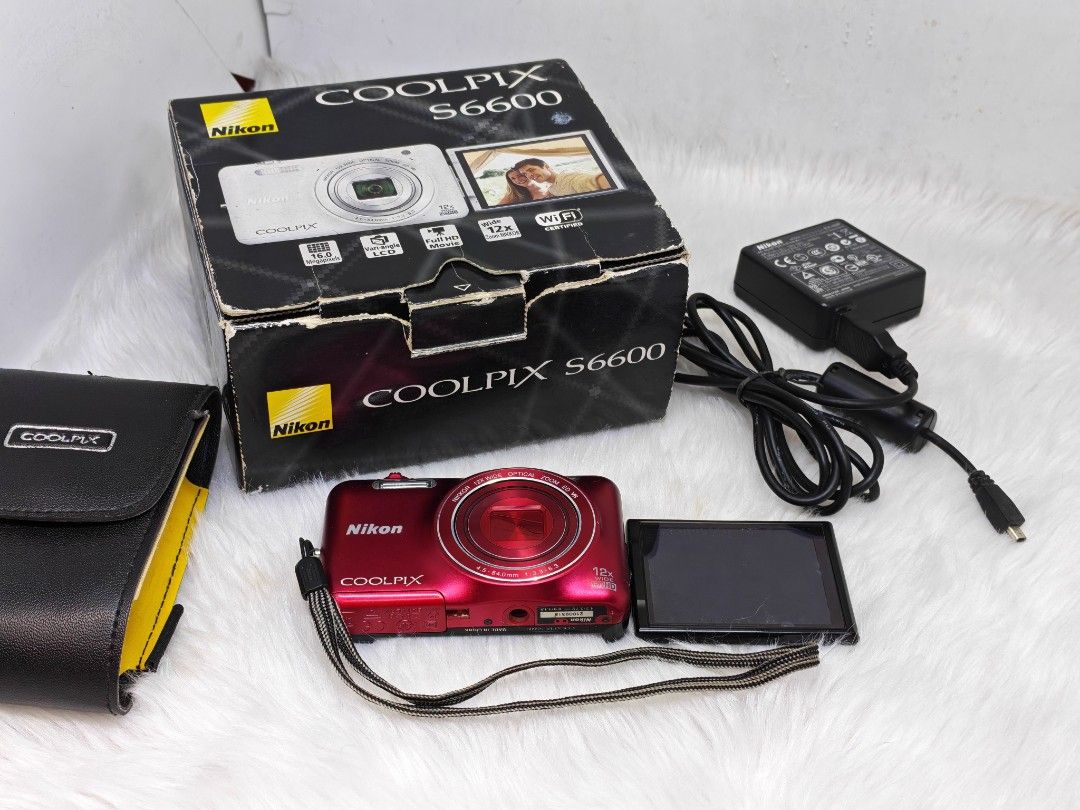 nikon coolpix s6600 (Category: Cameras) located in Manila. Submitted by ultimogizmos (Listing ID 1441836793, Image 1). Description: The Nikon Coolpix S6600 is a compact point-and-shoot camera known for its versatile 12x optical zoom and a fully articulating "flipping" LCD screen that makes it highly popular for selfies and vlogging. Key Features *16 megapixel BSI CMOS sensor *12x optical zoom lens (35mm equiv: 25-300mm) *Optical image stabilisati