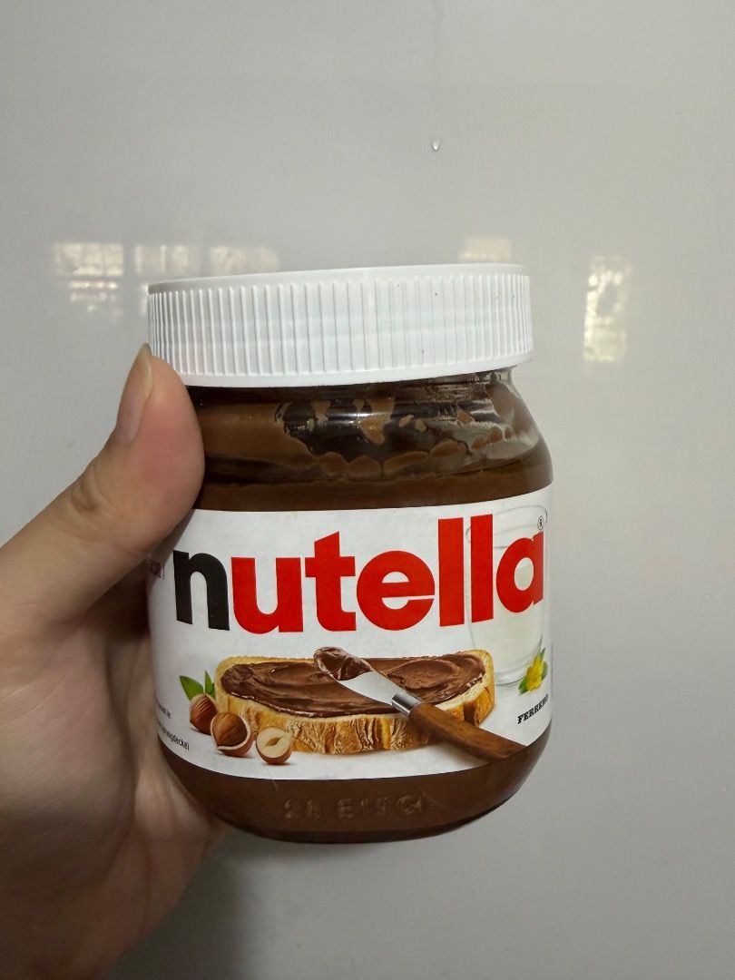 Nutella Hazelnut Spread with Cocoa 350g (Category: Other Food & Drinks) located in Cabanatuan. Submitted by gxxxgb (Listing ID 1441804115, Image 1). Description: - SEALED Nutella jar - Hazelnut spread with cocoa - Perfect for toast, baking, or eating as is! - Size: 350g - Best Before: 11.07.2025 - Bought at UAE - Storage: Keep in a cool, dry place - RFS: Hindi mahilig sa nutella.