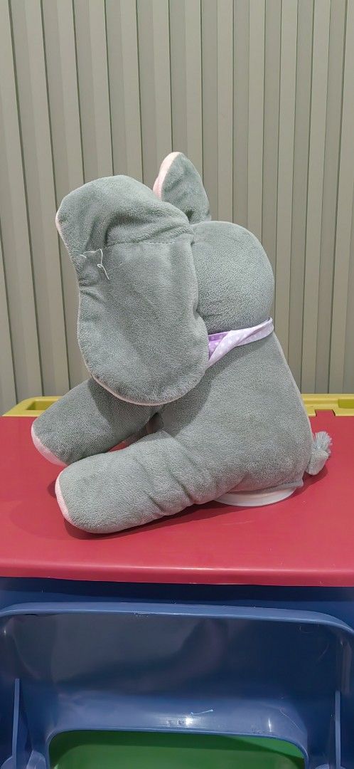 Peek-a-Boo Elephant Plush Toy (Category: Plushies & Soft Toys) located in Tagaytay City. Submitted by mrskai (Listing ID 1441901997, Image 3). Description: - Adorable peek-a-boo elephant plush toy. - Interactive feature: Ears move when foot is pressed. - Soft and cuddly grey elephant with charming pink accents. - Ideal gift for children. - Suitable for both playtime and bedtime. Good Condition. Sounds Working. Just need to replace Battery. Reason