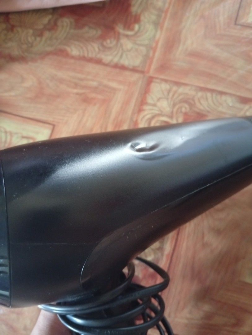 Philips Thermo protect drycare 2100w (Category: Hair) located in Quezon City. Submitted by purple_haven (Listing ID 1441799319, Image 3). Description: Philips Thermo protect 2100w hair dryer has dents pls see pics posted but doesn't affect the function.Still works well.