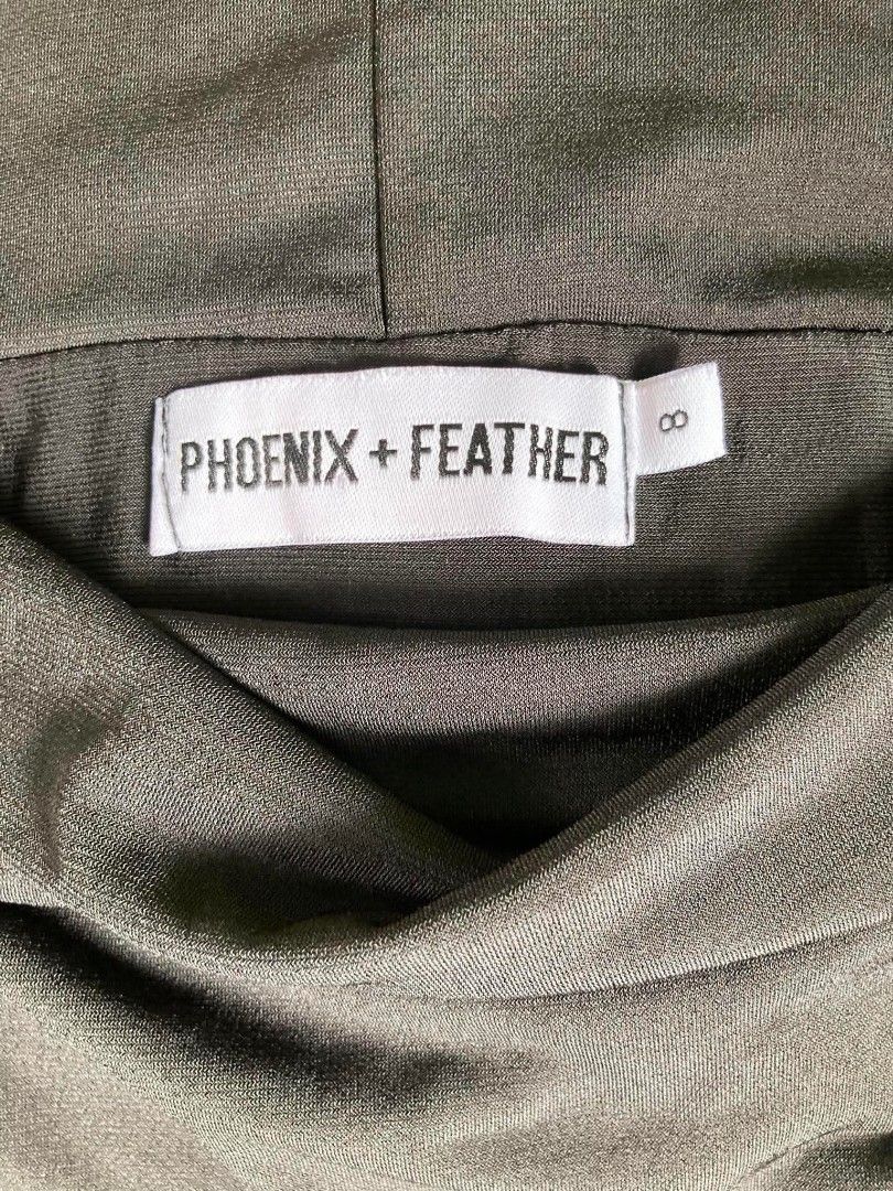 Phoenix + Feather Off Shoulder Midi Dress (Category: Dresses) located in Cavite. Submitted by eures_corner (Listing ID 1441808359, Image 3). Description: - Brand: Phoenix + Feather - Style: Off-shoulder midi dress - Sleeves: Long sleeves - Hem: Tulip hem - Material: Stretchy - Fit: Very flattering - Estimated Size: Fits like a size 8 - Occasion: Ideal for a night out or special events.