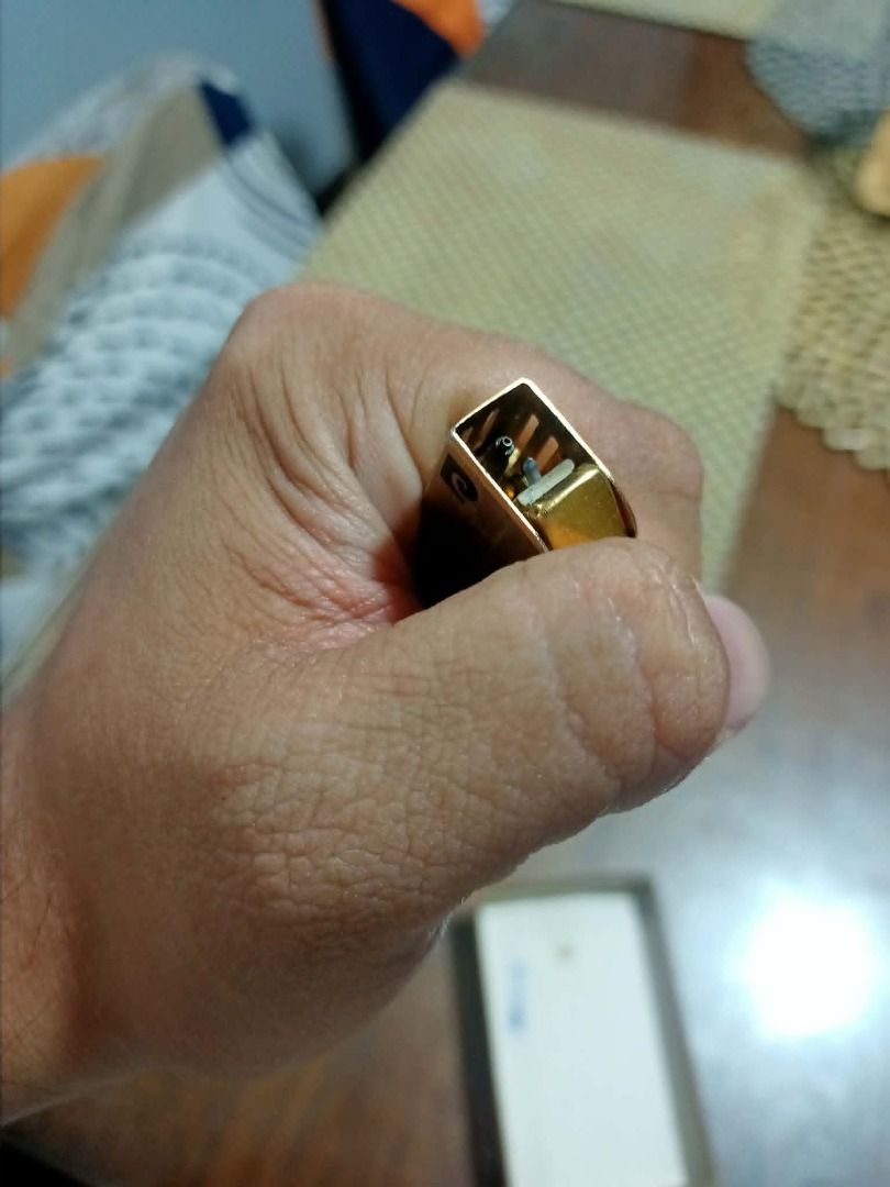 Pierre Cardin Lighter - Vintage Gold (Category: Luxury Accessories) located in Mandaluyong City. Submitted by adriandelacruz3840 (Listing ID 1441829649, Image 3). Description: Vintage Pierre Cardin Slim Gold-Tone Gas Lighter For sale: An authentic, vintage Pierre Cardin pocket gas lighter featuring a sleek, ultra-slim silhouette. It has an elegant brushed gold-tone finish with the classic cursive Pierre Cardin signature beautifully engraved at th