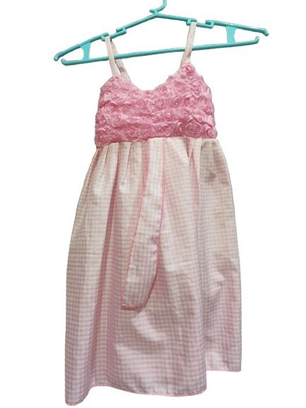 Pink Gingham Dress with Rosette Bodice (Category: Babies & Kids Fashion) located in Quezon City. Submitted by Think_Like_Chinita (Listing ID 1441897409, Image 1). Description: - Cute pink gingham dress - Rosette bodice with spaghetti straps - Smocked back for a comfortable fit - Perfect for parties or special occasions - Skirt with a lovely flow - Comes with a matching sash.