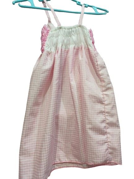Pink Gingham Dress with Rosette Bodice (Category: Babies & Kids Fashion) located in Quezon City. Submitted by Think_Like_Chinita (Listing ID 1441897409, Image 2). Description: - Cute pink gingham dress - Rosette bodice with spaghetti straps - Smocked back for a comfortable fit - Perfect for parties or special occasions - Skirt with a lovely flow - Comes with a matching sash.
