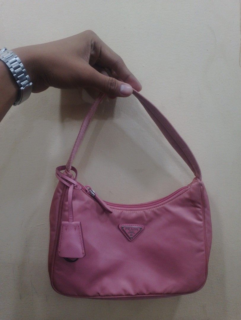 Pink Prada 2000 nylon mini hobo (Category: Luxury Bags & Wallets) located in Bacolod City. Submitted by slurpy_thrift (Listing ID 1441864558, Image 1). Description: .