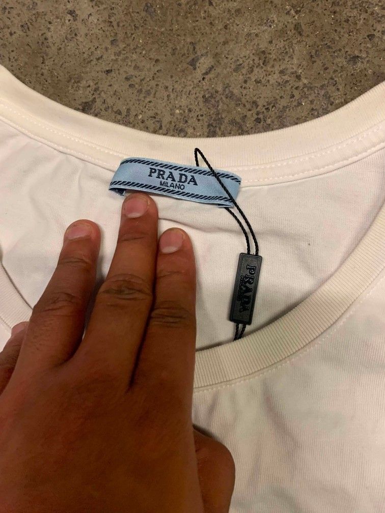 Prada Milano White Tank Top Size M (Category: Sleeveless) located in Polomolok. Submitted by warmfire.3185dd (Listing ID 1441961085, Image 2). Description: Prada tank top excellent condition need wash width' 22.5 length'30. 5 .