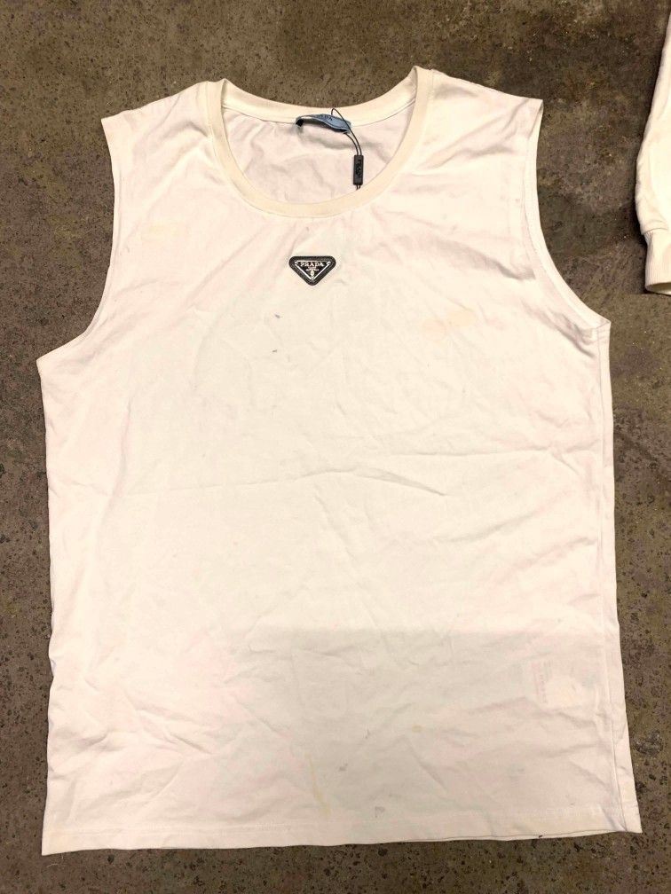 Prada Milano White Tank Top Size M (Category: Sleeveless) located in Polomolok. Submitted by warmfire.3185dd (Listing ID 1441961085, Image 1). Description: Prada tank top excellent condition need wash width' 22.5 length'30. 5 .