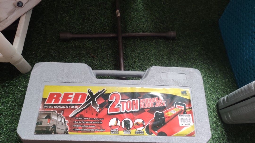RED X 2 Ton Hydraulic Floor Jack with Case (Category: Other Automotive Parts and Accessories) located in Cavite. Submitted by kramnivlaaicrag (Listing ID 1441848269, Image 3). Description: - Heavy-duty 2-ton hydraulic floor jack - Ideal for cars, mid-size SUVs, and ATVs - Maximum lifting height: 320mm - Portable and easy to store in its included case - Conforms with international standards - Includes a lug wrench.