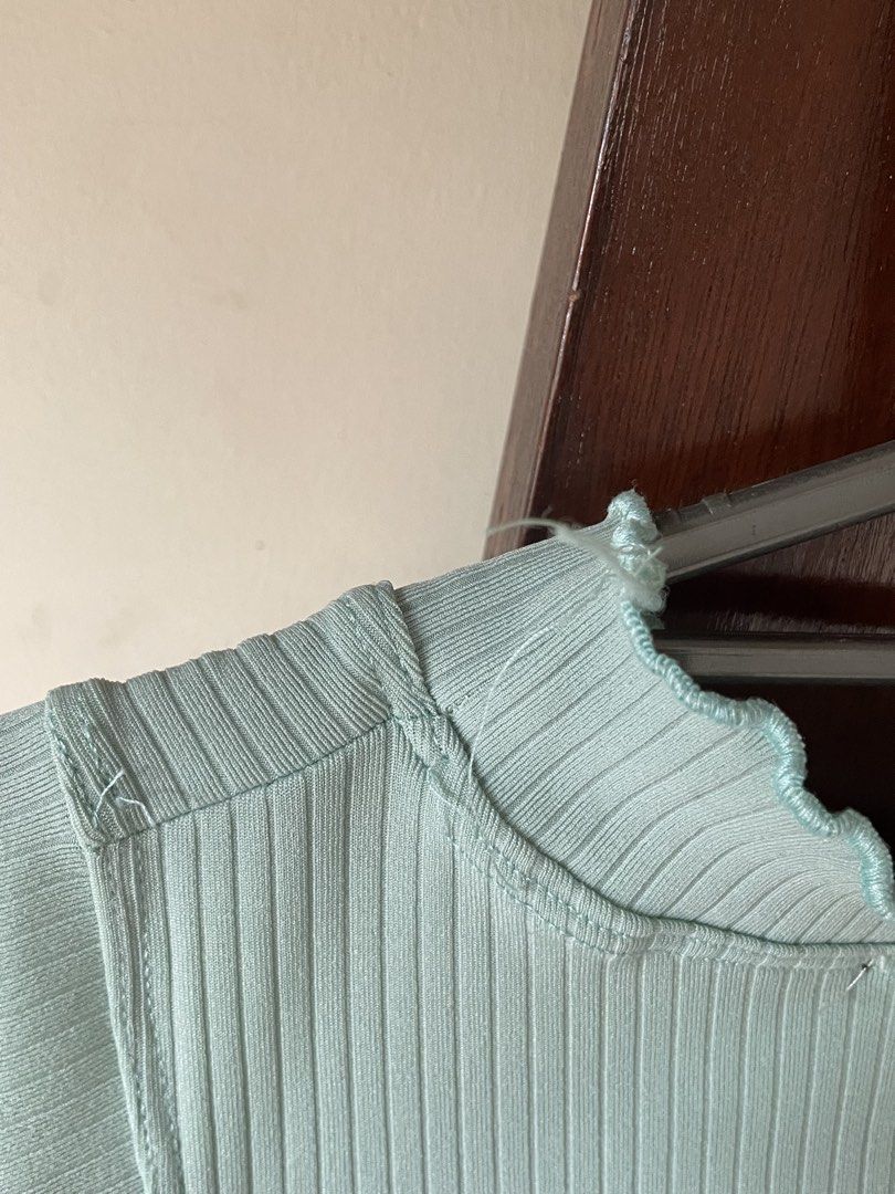 Ribbed Sleeveless Top (Category: Sleeveless) located in Pasig City. Submitted by ysaint (Listing ID 1441794440, Image 3). Description: mint green ribbed top, with mock neck perfect for cute and comfy casual wear fits small :).
