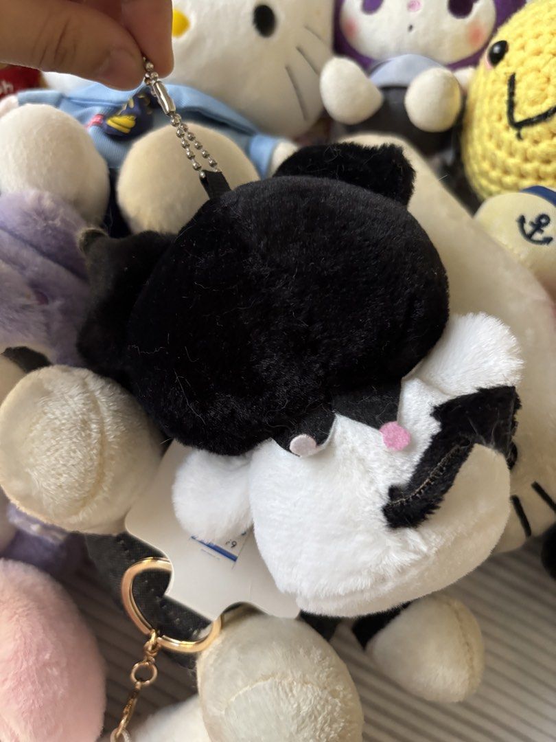 Sanrio Kuromi Plush Keychain Charm (Category: Plushies & Soft Toys) located in Manila. Submitted by mpt99876 (Listing ID 1441798292, Image 2). Description: - Adorable Kuromi plush keychain - Made with soft and fluffy material - Features a cute skull detail on the head - Ideal for decorating bags or keys - A must-have gift for Sanrio enthusiasts - Perfect addition to any plush collection.