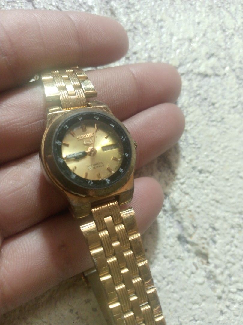 Seiko 5 Automatic Gold Tone Ladies Watch (Category: Women's Watches) located in Manila. Submitted by epicwind_1bf746 (Listing ID 1441822443, Image 2). Description: - Gold tone Seiko 5 ladies watch - Automatic movement with 21 jewels - Gold colored dial - Gold tone bracelet - Still a nice and functional timepiece.