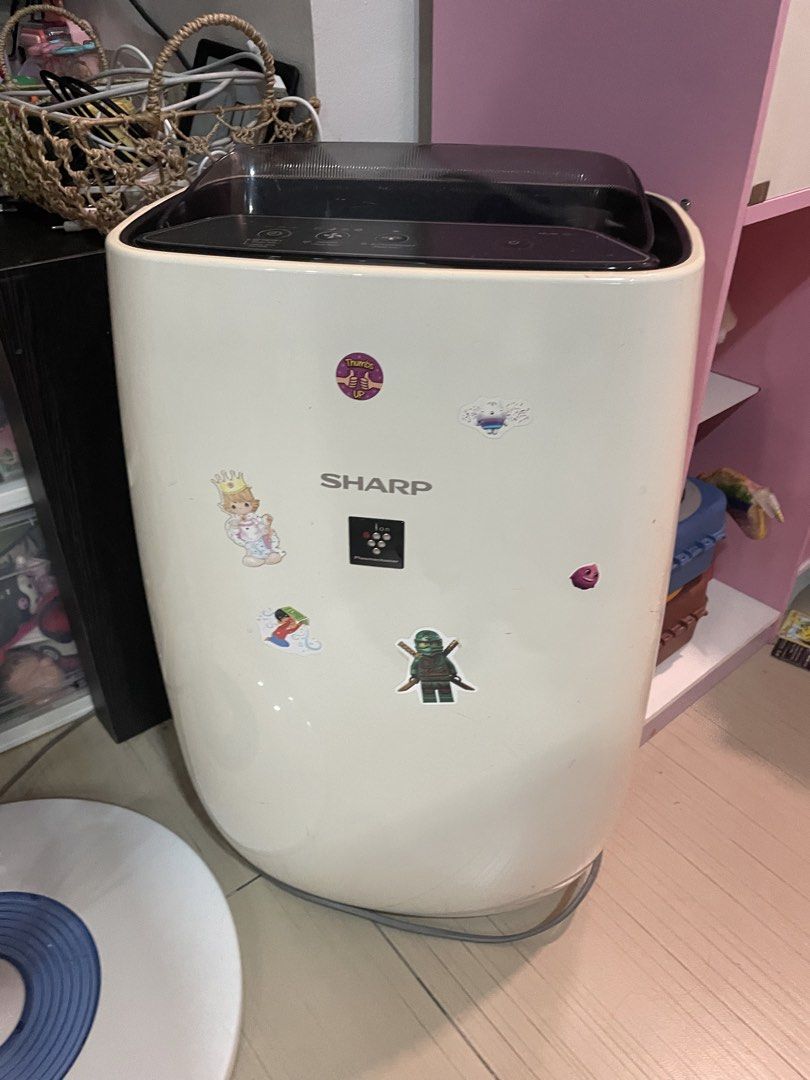 Sharp Air Purifier FP-J40E-W (Category: Air Purifiers & Dehumidifiers) located in Taguig. Submitted by declutterjam (Listing ID 1441896051, Image 1). Description: - Sharp Air Purifier FP-J40E-W - Works with 220-240V power supply - Equipped with HEPA and Deodorizing filters (see last pic) - Made in Thailand - Minor sticker marks on the front panel We haven’t been using it anymore. The filters need replacement. .