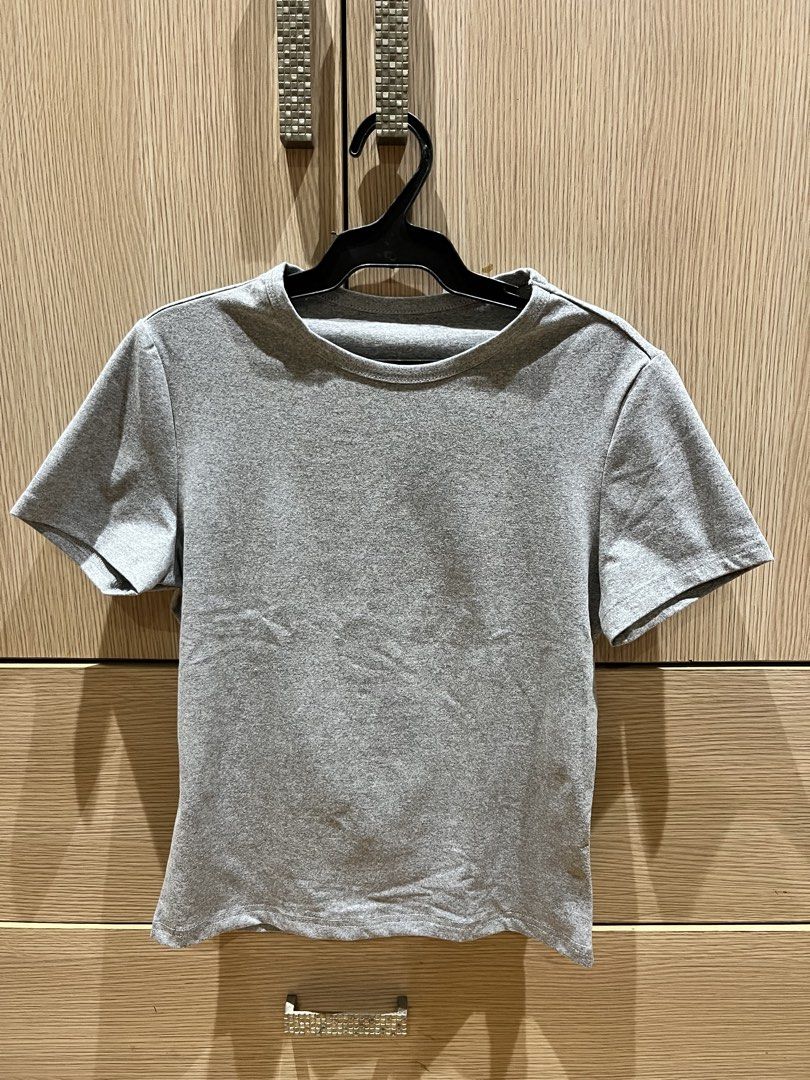 Shein Grey T-shirt Top (Category: Shirts) located in Mandaluyong City. Submitted by hyyzl (Listing ID 1441947147, Image 1). Description: Brand: Shein - 10/10 condition, like new (worn once) - cotton fabric - stretchy, fitted material - can fit S-M RFS: Decluttering Message for other price offers/questions..