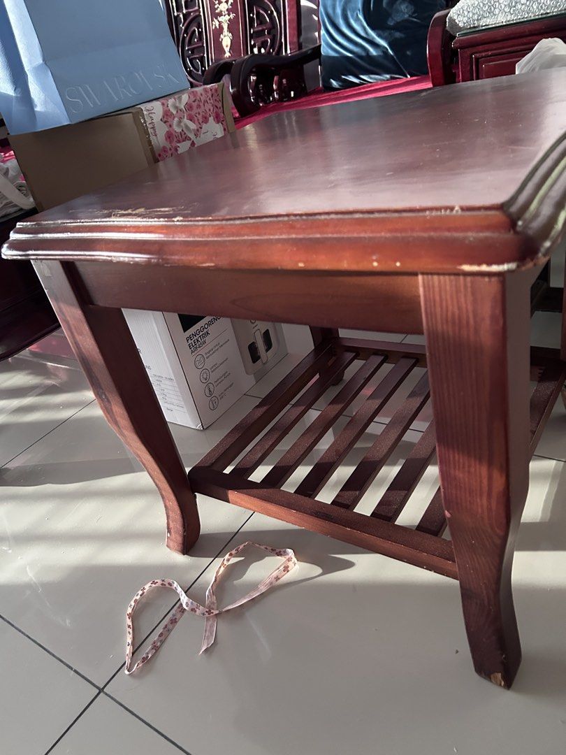 Small table (Category: Tables & Sets) located in Shah Alam. Submitted by wildwind.33b466 (Listing ID 1441882166, Image 2). Description: Solid wood side table / small coffee table, curved leg classic design. ✅ Full solid wood, sturdy structure, no crack or wobble ✅ Top flat surface + bottom slatted rack for storage ✅ Slight minor paint chip only, functional perfect for sofa side/bedside/balcony use.