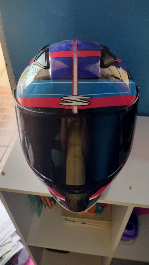 Spyder Rogue Motorcycle Helmet (Category: Helmets and other Riding Gears) located in Muntinlupa City. Submitted by misisjfelices (Listing ID 1441855822, Image 1). Description: - Spyder Rogue Full Face Motorcycle Helmet - Size: XL - Color: Black with blue, red, and white accents - Features: Dark tinted visor - Ideal for riding RFS: Wala na pong gumagamit price is negotiable walang dust bag may signs of usage na din po.