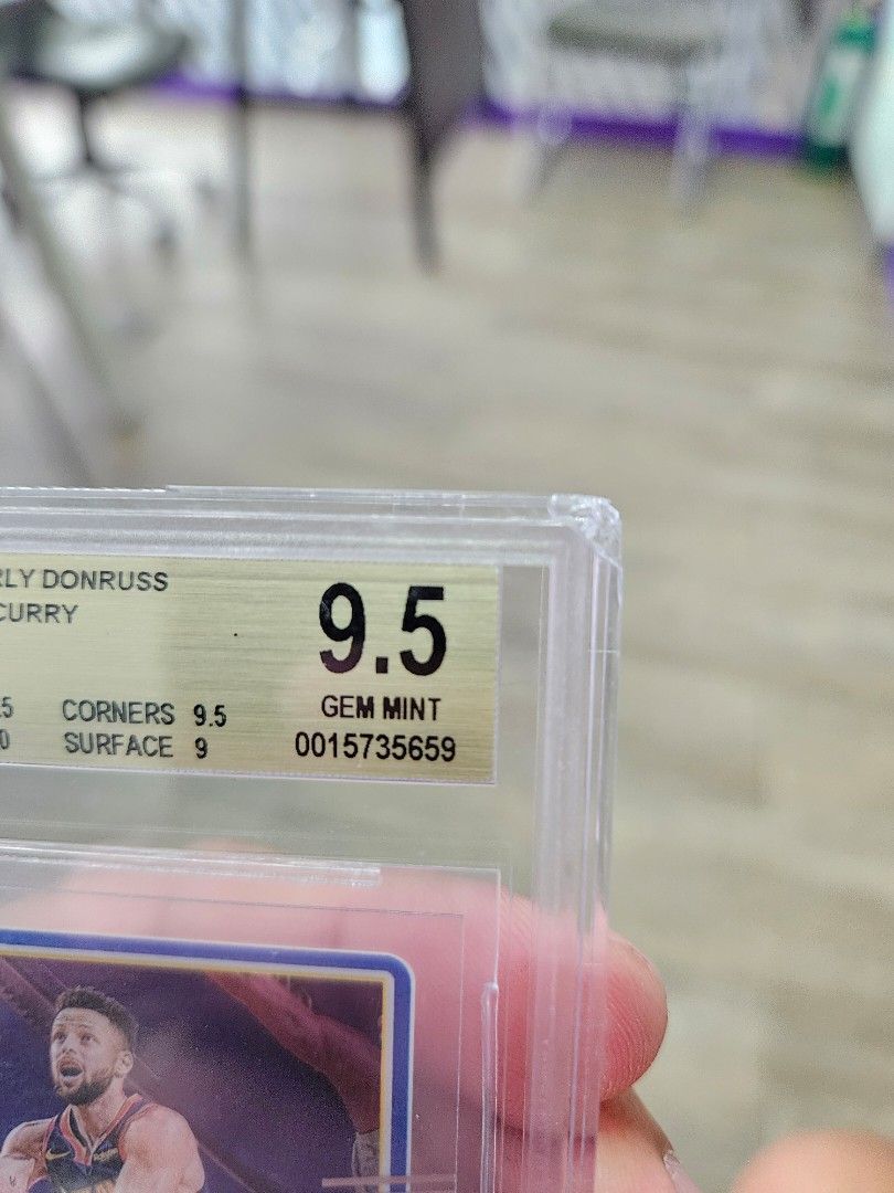 Steph curry clearly BGS 9.5 (Category: Graded Singles) located in San Jose. Submitted by gabkarton (Listing ID 1441828708, Image 2). Description: For sale Steph curry clearly BGS 9.5(has minor chip) see pics Selling low because of the chip 3.5k only.