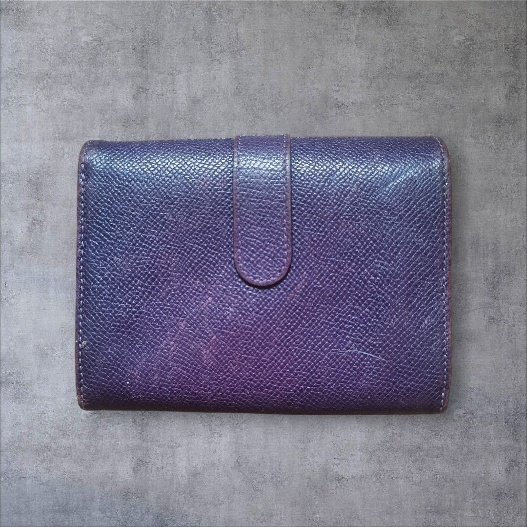 TOD'S Purple Textured Leather Tri-Fold Wallet (Category: Wallets & Card holders) located in Manila. Submitted by eagerbeaverph (Listing ID 1441862886, Image 2). Description: Tods wallet H 4 inches W 5 Signs of usage Rubs scratches creases Please see detailed pics Neg Dm.