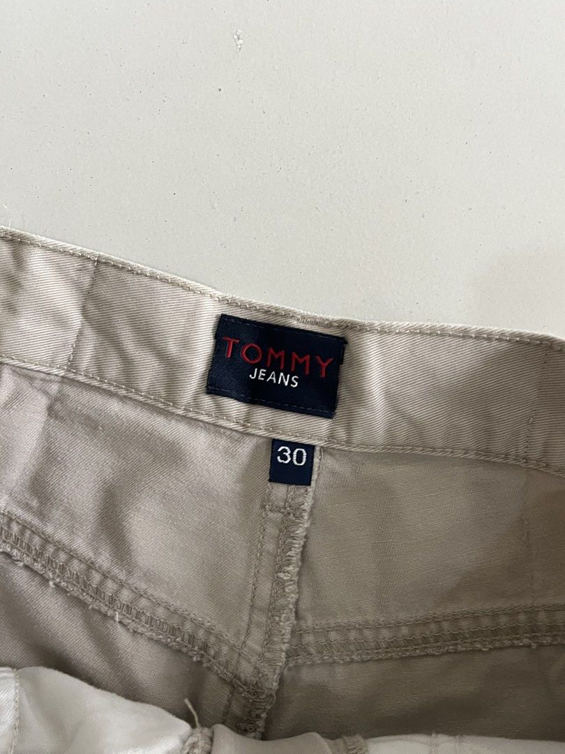 Tommy Jeans Beige Cargo Pants Size 30 (Category: Jeans) located in Quezon City. Submitted by mbaut (Listing ID 1441840550, Image 1). Description: - Beige Tommy Jeans cargo pants - Size 30 waist - Classic cargo style with multiple pockets - Perfect for casual wear - Feel free to ask questions!.