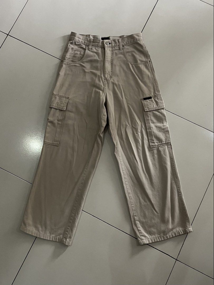 Tommy Jeans Beige Cargo Pants Size 30 (Category: Jeans) located in Quezon City. Submitted by mbaut (Listing ID 1441840550, Image 2). Description: - Beige Tommy Jeans cargo pants - Size 30 waist - Classic cargo style with multiple pockets - Perfect for casual wear - Feel free to ask questions!.