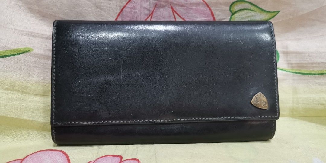 TORRINO LAMBORGHINI Black long leather wallet (Category: Wallets & Card Holders) located in Baguio. Submitted by princessjhade (Listing ID 1441858895, Image 1). Description: Very good condition Plus shipping.