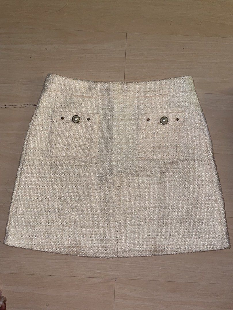 Tweed Mini Skirt with Pearl Button Details (Category: Skirts) located in Manila. Submitted by minchaemin (Listing ID 1441965598, Image 1). Description: - tweed mini skirt - Two front pockets with elegant pearl button details Tweed skirt Size 28in Length 16in Large on tag Location: Tondo, Manila Delivery: Lalamove/SDD Payment: Bank transfer .