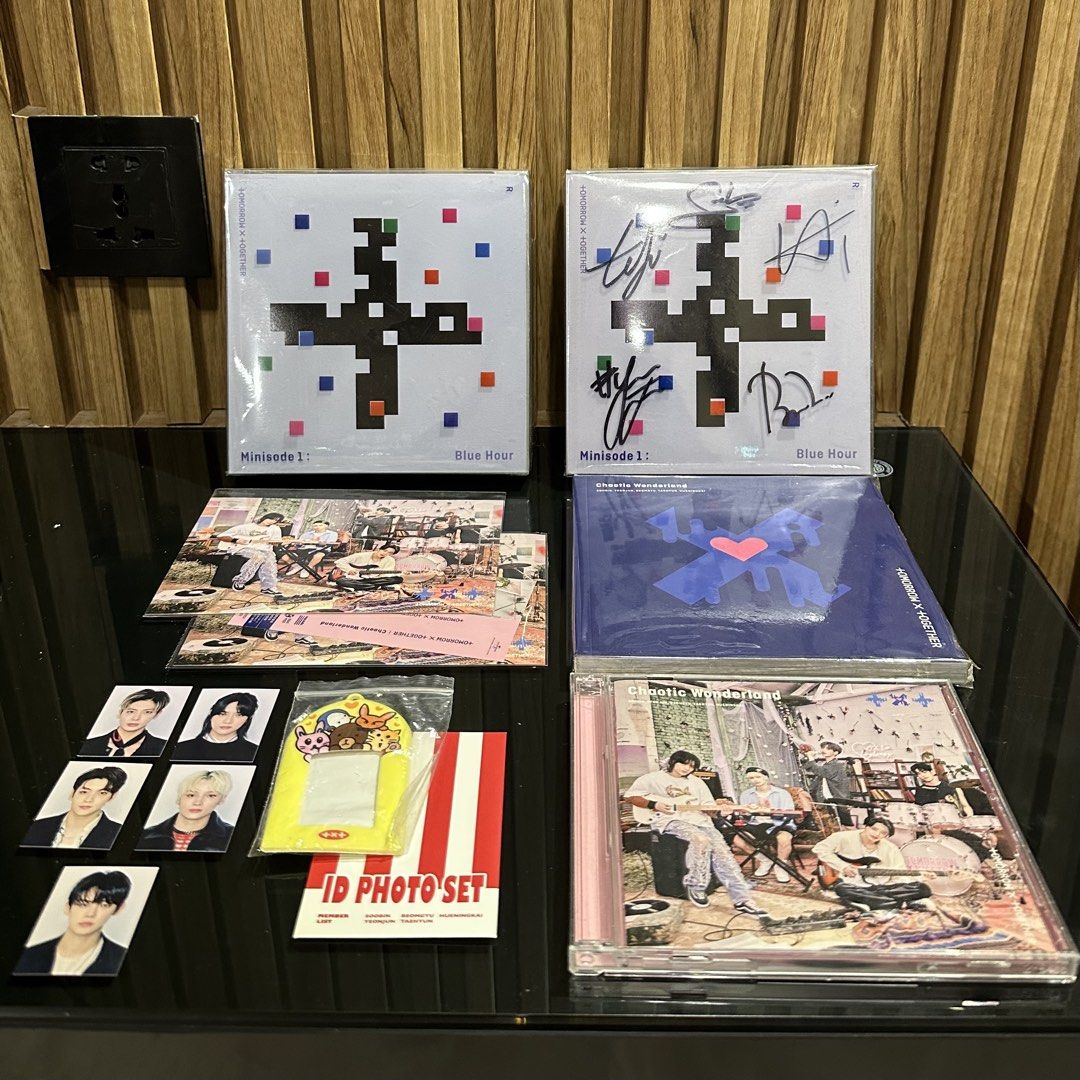 TXT OFFICIAL SIGNED ALBUM BUNDLE (Category: K-Wave Merchandise) located in Manila. Submitted by yours.fully (Listing ID 1441865772, Image 2). Description: Selling as a set. All items are official. Inclusions: ✦ 1 Signed Minisode1: Blue Hour Album (with photocard) ✦ 1 Minisode1: Blue Hour Album (no photocard) ✦ 1 Chaotic Wonderland Limited Edition B Album (no photocard) ✦ 2 Official TXT Postcards ✦ 1 TXT 2022 Deco Kit ID Photo Set Condition: ✓ Alb