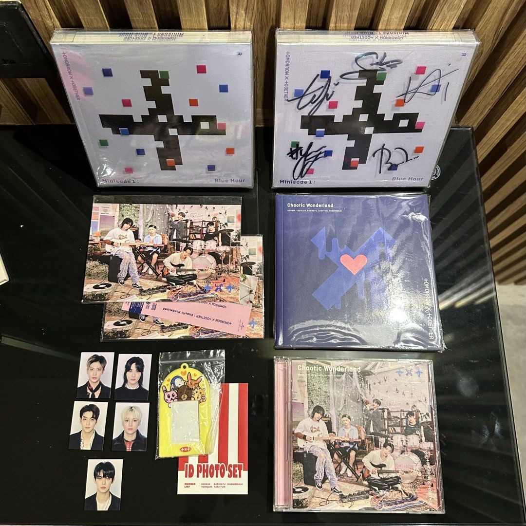 TXT OFFICIAL SIGNED ALBUM BUNDLE (Category: K-Wave Merchandise) located in Manila. Submitted by yours.fully (Listing ID 1441865772, Image 1). Description: Selling as a set. All items are official. Inclusions: ✦ 1 Signed Minisode1: Blue Hour Album (with photocard) ✦ 1 Minisode1: Blue Hour Album (no photocard) ✦ 1 Chaotic Wonderland Limited Edition B Album (no photocard) ✦ 2 Official TXT Postcards ✦ 1 TXT 2022 Deco Kit ID Photo Set Condition: ✓ Alb